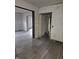 Gray vinyl flooring and doorways in a renovated home at 1207 W 35Th St, Indianapolis, IN 46208