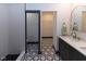 Modern bathroom with hexagon tile floor and walk-in shower at 1510 S Talbott St, Indianapolis, IN 46225