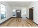 Light and bright living room with hardwood floors and neutral decor at 1510 S Talbott St, Indianapolis, IN 46225