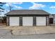 Three-car garage with white doors, offering convenient parking at 219 E 10Th St, Indianapolis, IN 46202