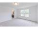 Bright bedroom with a view and ensuite bathroom access at 239 Ambassador Dr, Pittsboro, IN 46167