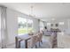 Casual dining area with sliding glass doors leading to backyard at 239 Ambassador Dr, Pittsboro, IN 46167