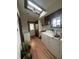 Laundry room with washer, dryer, and skylight at 323 E Franklin St, Shelbyville, IN 46176
