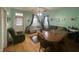 Light and airy living room with hardwood floors and a dining area at 323 E Franklin St, Shelbyville, IN 46176