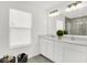 Elegant bathroom featuring a double vanity and large mirror at 3578 Planck Cir, Danville, IN 46122