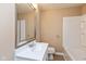 Clean bathroom with white vanity and bathtub at 3709 Fletcher Ave, Indianapolis, IN 46203