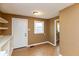 Laundry room with built-in shelving and a window at 3709 Fletcher Ave, Indianapolis, IN 46203