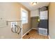 Laundry room with washer and dryer hookups and window at 3709 Fletcher Ave, Indianapolis, IN 46203