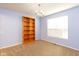 Bright dining room with hardwood floors and built-in shelving at 6094 Saw Mill Dr, Noblesville, IN 46062