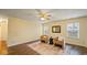 Living room featuring hardwood floors and cozy seating at 6369 River Valley Way, Indianapolis, IN 46221