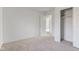 Spacious bedroom featuring neutral walls and carpet at 7909 Benjamin Dr, Indianapolis, IN 46226