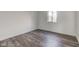 Spacious bedroom featuring neutral walls and new flooring at 7909 Benjamin Dr, Indianapolis, IN 46226