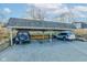 Covered carport providing parking for two vehicles at 7909 Benjamin Dr, Indianapolis, IN 46226
