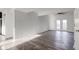Spacious living room with wood flooring and access to a patio at 7909 Benjamin Dr, Indianapolis, IN 46226