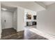 Open living area with dark gray kitchen visible at 7909 Benjamin Dr, Indianapolis, IN 46226