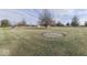Spacious backyard with mature trees and landscaping at 9048 N Watson Meadows Ln, Mooresville, IN 46158