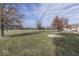 Large backyard with mature trees and landscaping at 9048 N Watson Meadows Ln, Mooresville, IN 46158