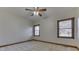 Bright bedroom with ceiling fan and carpeting at 9048 N Watson Meadows Ln, Mooresville, IN 46158