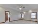 Large bedroom with ceiling fan, two windows, and hardwood trim at 9048 N Watson Meadows Ln, Mooresville, IN 46158