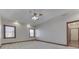 Spacious bedroom with ceiling fan and neutral color scheme at 9048 N Watson Meadows Ln, Mooresville, IN 46158