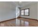 Bright bedroom with hardwood floors and large window at 9048 N Watson Meadows Ln, Mooresville, IN 46158