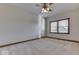 Bedroom with ceiling fan and window at 9048 N Watson Meadows Ln, Mooresville, IN 46158