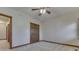 Bedroom with ceiling fan and double doors at 9048 N Watson Meadows Ln, Mooresville, IN 46158