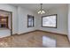 Bright dining room featuring hardwood floors and chandelier at 9048 N Watson Meadows Ln, Mooresville, IN 46158