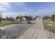 House with a long driveway leading to a detached garage at 9048 N Watson Meadows Ln, Mooresville, IN 46158