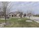 Ranch style brick home with a large yard at 9048 N Watson Meadows Ln, Mooresville, IN 46158