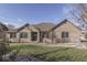 Brick ranch home with landscaped lawn at 9048 N Watson Meadows Ln, Mooresville, IN 46158