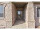 Front entry with tiled flooring and glass door at 9048 N Watson Meadows Ln, Mooresville, IN 46158