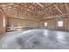 Unfinished garage with concrete floor and two garage doors at 9048 N Watson Meadows Ln, Mooresville, IN 46158