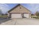 Spacious two-car brick garage with large driveway at 9048 N Watson Meadows Ln, Mooresville, IN 46158