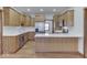 Modern kitchen with stainless steel appliances and wood cabinets at 9048 N Watson Meadows Ln, Mooresville, IN 46158