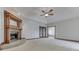 Living room featuring a fireplace and built-in shelving at 9048 N Watson Meadows Ln, Mooresville, IN 46158
