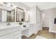 Double vanity bathroom with walk in shower and good natural light at 1014 Stonehaven Dr, Indianapolis, IN 46239