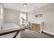 Neutral Bedroom with a crib, armchair, and changing table at 1014 Stonehaven Dr, Indianapolis, IN 46239