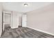 Spacious bedroom with carpet, large closet, and access to other rooms at 1014 Stonehaven Dr, Indianapolis, IN 46239
