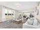 Spacious living room, open concept kitchen, and access to a patio at 1014 Stonehaven Dr, Indianapolis, IN 46239