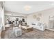 Open living room with a view into the kitchen at 1014 Stonehaven Dr, Indianapolis, IN 46239