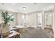 Spacious playroom with a sitting area and access to other rooms at 1014 Stonehaven Dr, Indianapolis, IN 46239