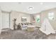 Bright playroom featuring a comfy couch and teepee at 1014 Stonehaven Dr, Indianapolis, IN 46239