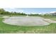 Serene pond with a fountain, surrounded by lush greenery at 1014 Stonehaven Dr, Indianapolis, IN 46239