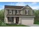 Two-story house with gray siding, brown accents, and a two-car garage at 1875 Black Oak Dr, Shelbyville, IN 46176