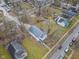 Aerial view showcasing the home's location, driveway, and surrounding neighborhood at 2709 Station St, Indianapolis, IN 46218