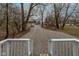 View from the back porch of a gravel driveway and neighboring houses at 2709 Station St, Indianapolis, IN 46218