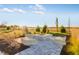 Community fire pit area with stone seating and landscaping at 310 N Bur Oak Dr, Mooresville, IN 46158