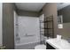 Bathroom with shower/tub combo, and dark vanity at 3105 N Tacoma Ave, Indianapolis, IN 46218