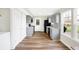 Modern kitchen with gray cabinets, white backsplash, and stainless steel appliances at 3826 Maple Manor Dr, Indianapolis, IN 46237